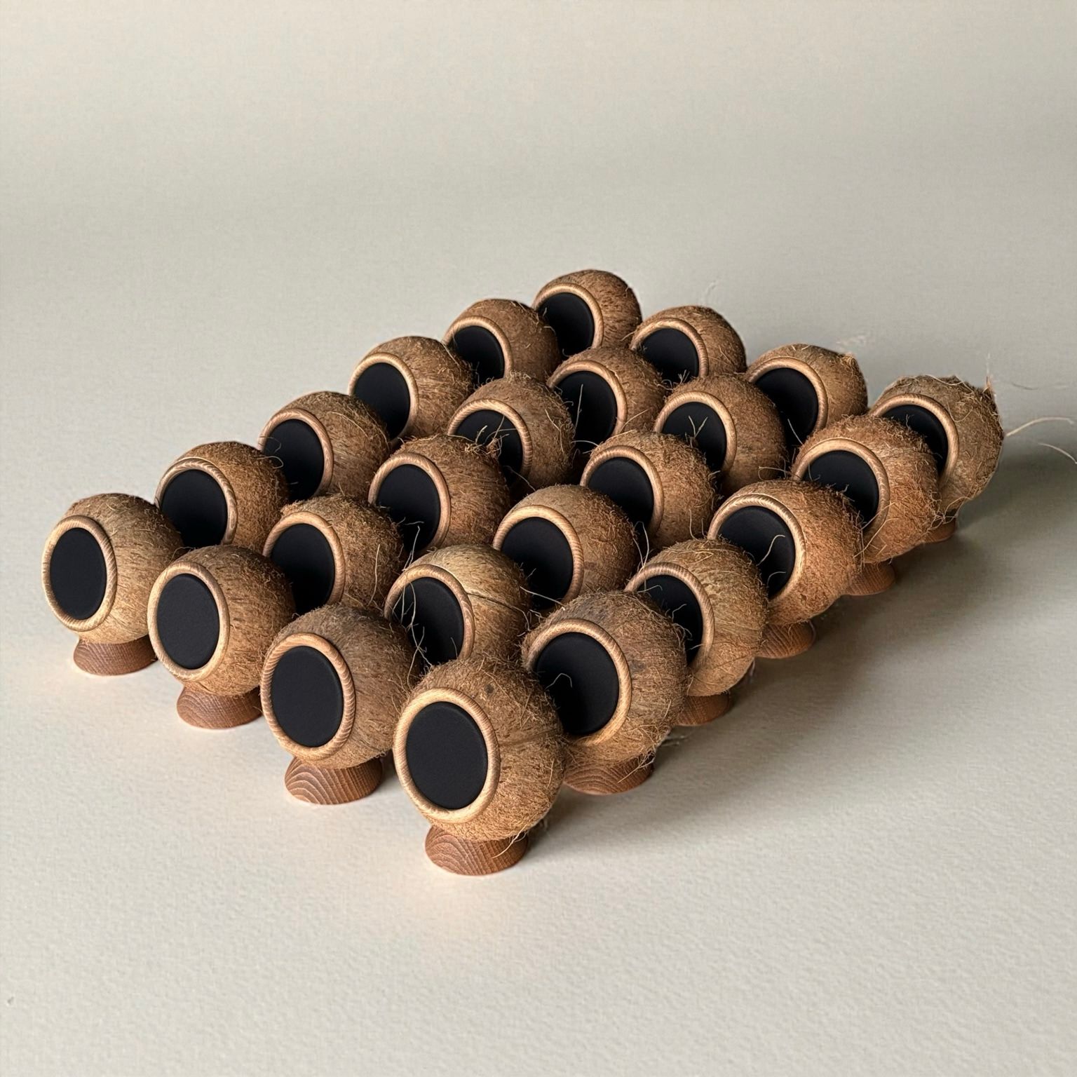 A group of Coconut speakers arranged together.